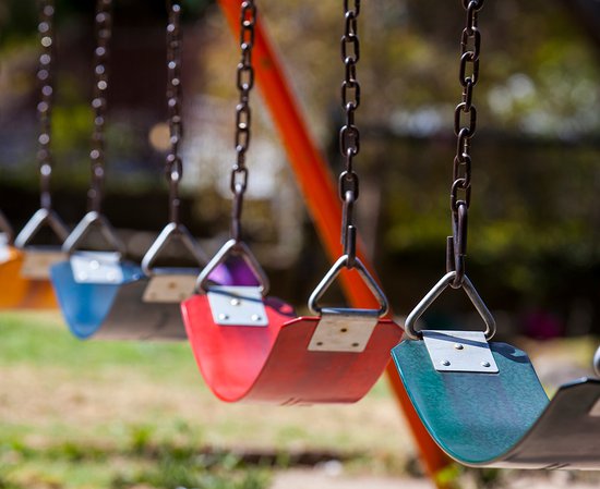 Empty-colorful-swings-at-the-park